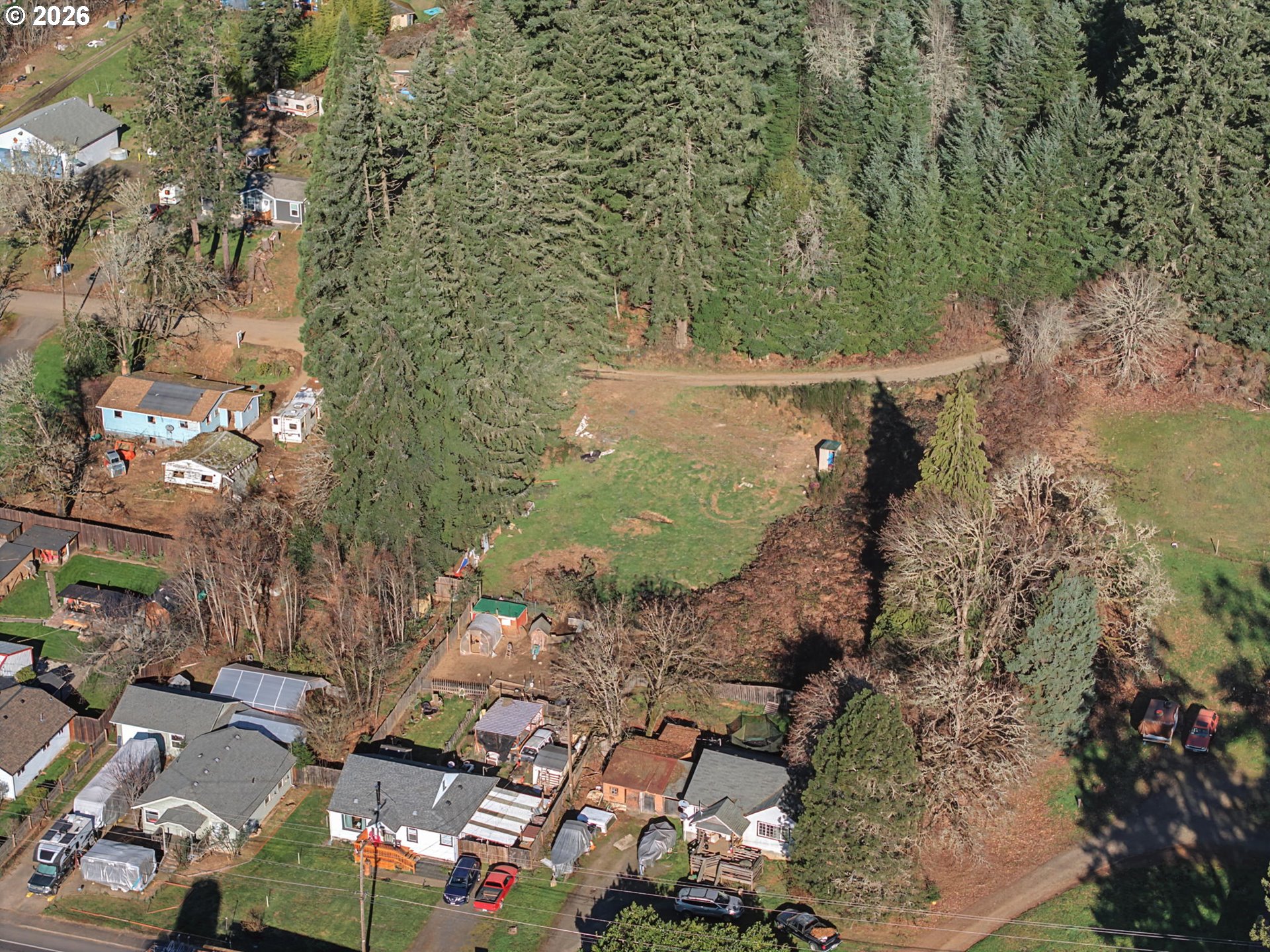 Fir Street Noti, OR 97461 - Photo 4 of 5 an aerial view of residential house with outdoor space