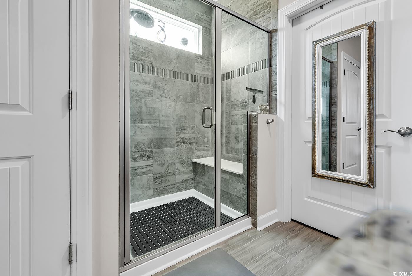 296 Switchgrass Loop Little River, SC 29566 - Photo 22 of 40 Full bathroom featuring a shower stall