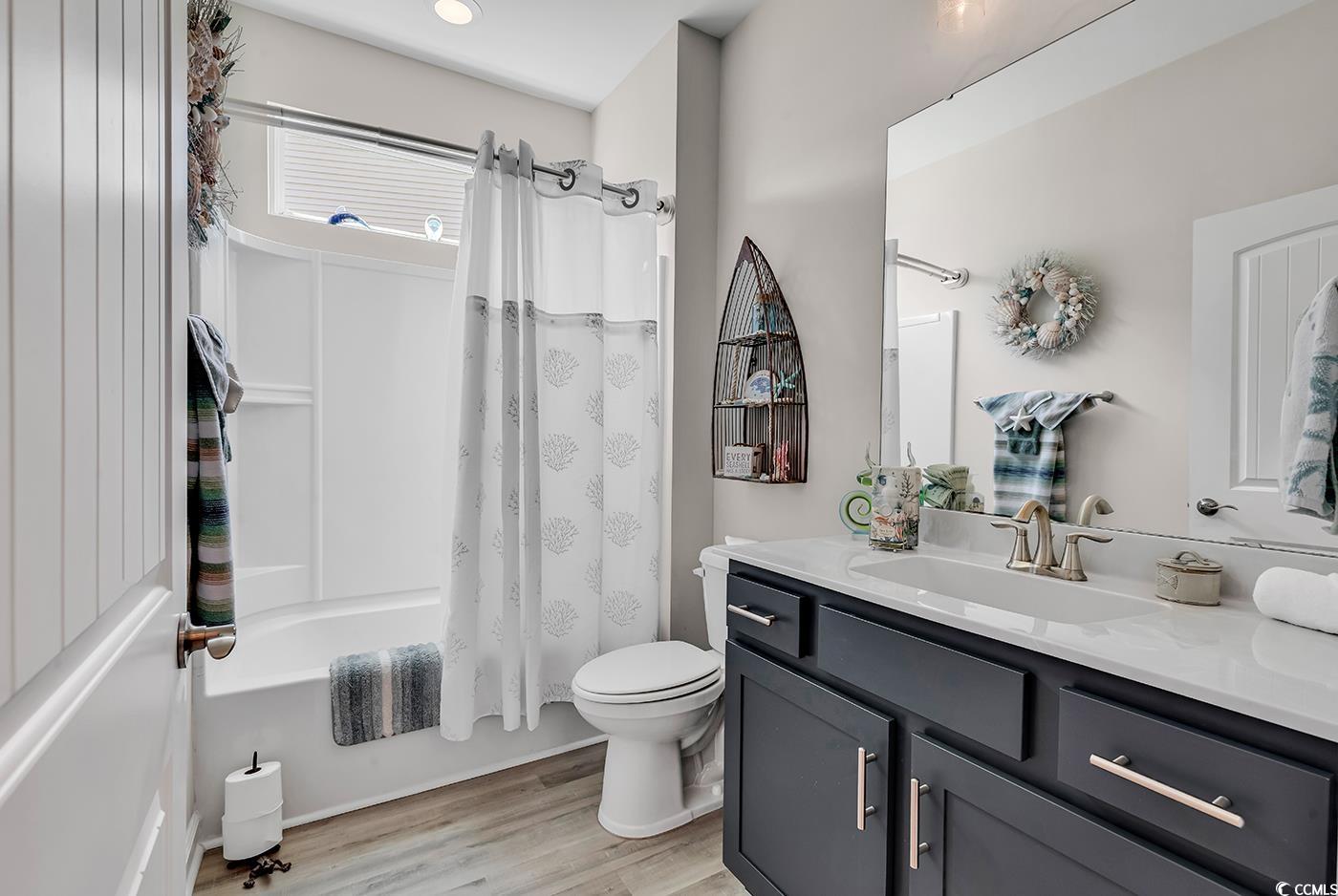 296 Switchgrass Loop Little River, SC 29566 - Photo 5 of 40 Full bathroom with shower / bath combination with