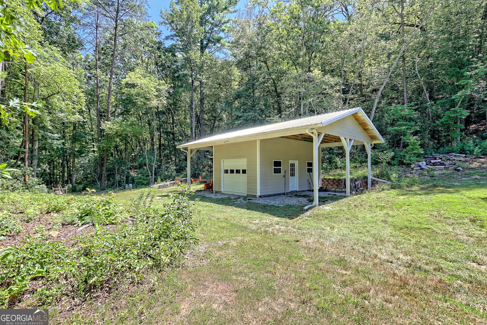 208 Colony Road Dillard, GA 30537 - Photo 20 of 80 a view of a house with a yard
