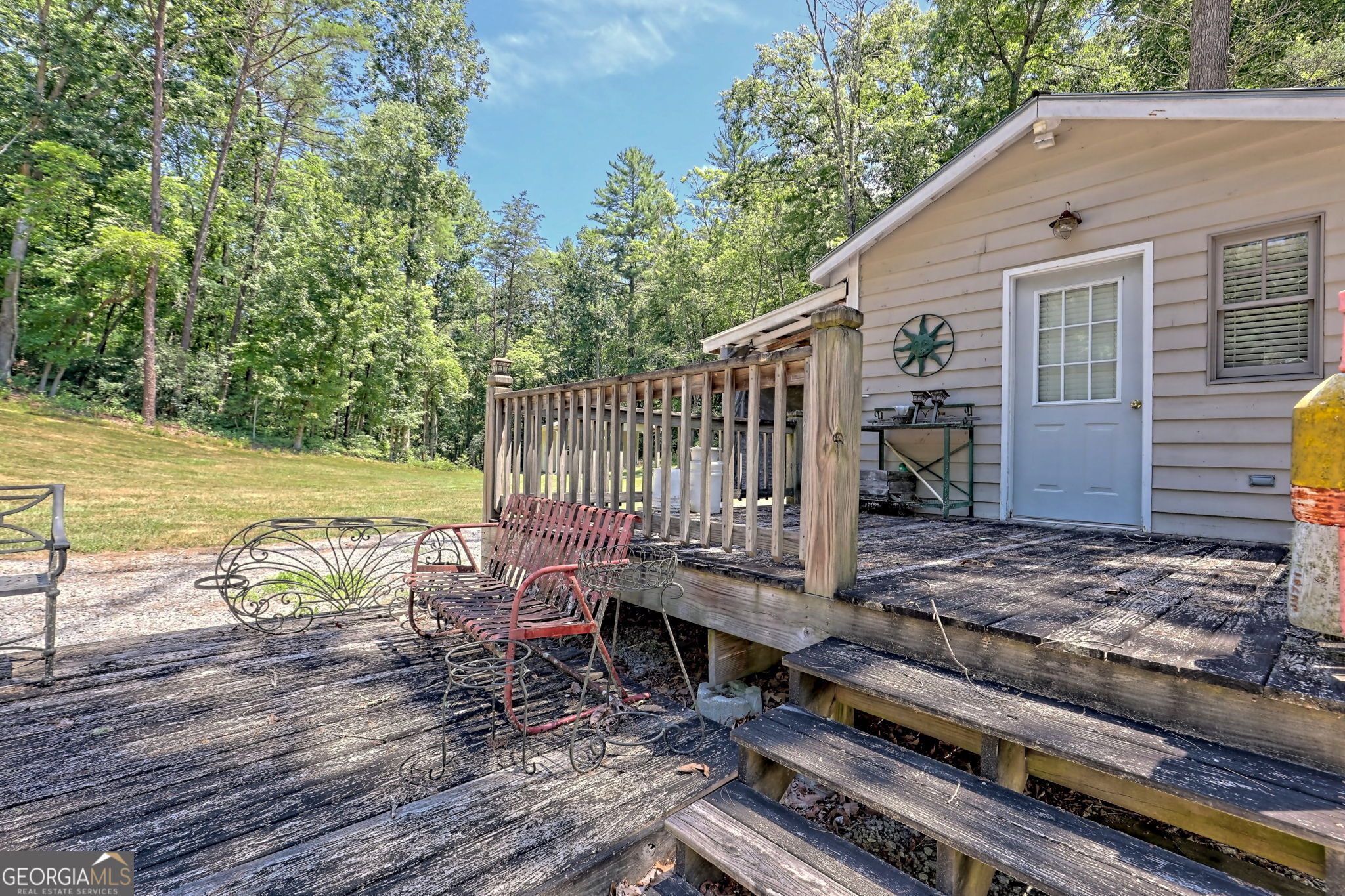 208 Colony Road Dillard, GA 30537 - Photo 24 of 80 a view of a roof deck with wooden floor and fence