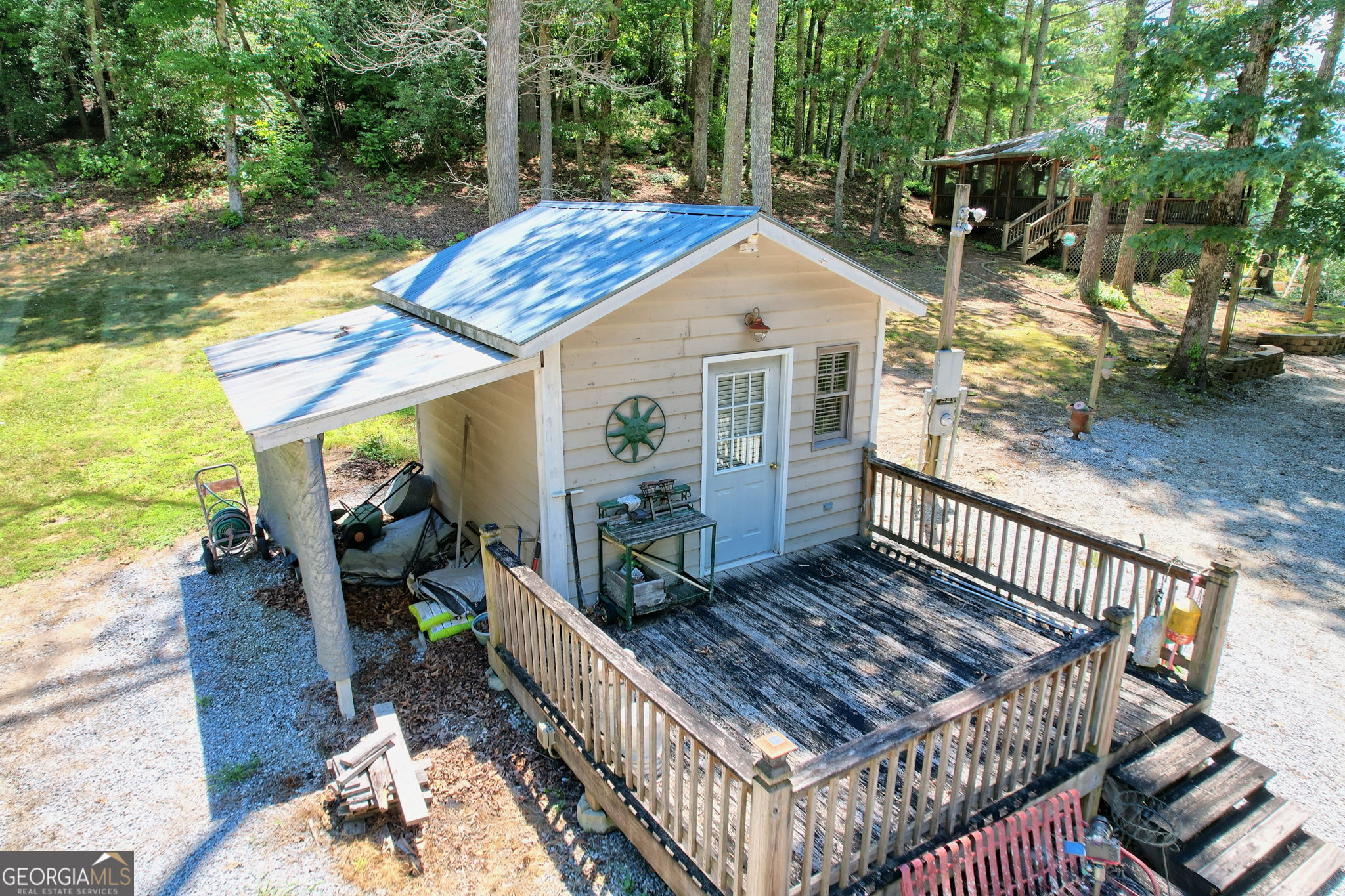 208 Colony Road Dillard, GA 30537 - Photo 25 of 80 a view of a house with backyard and sitting area
