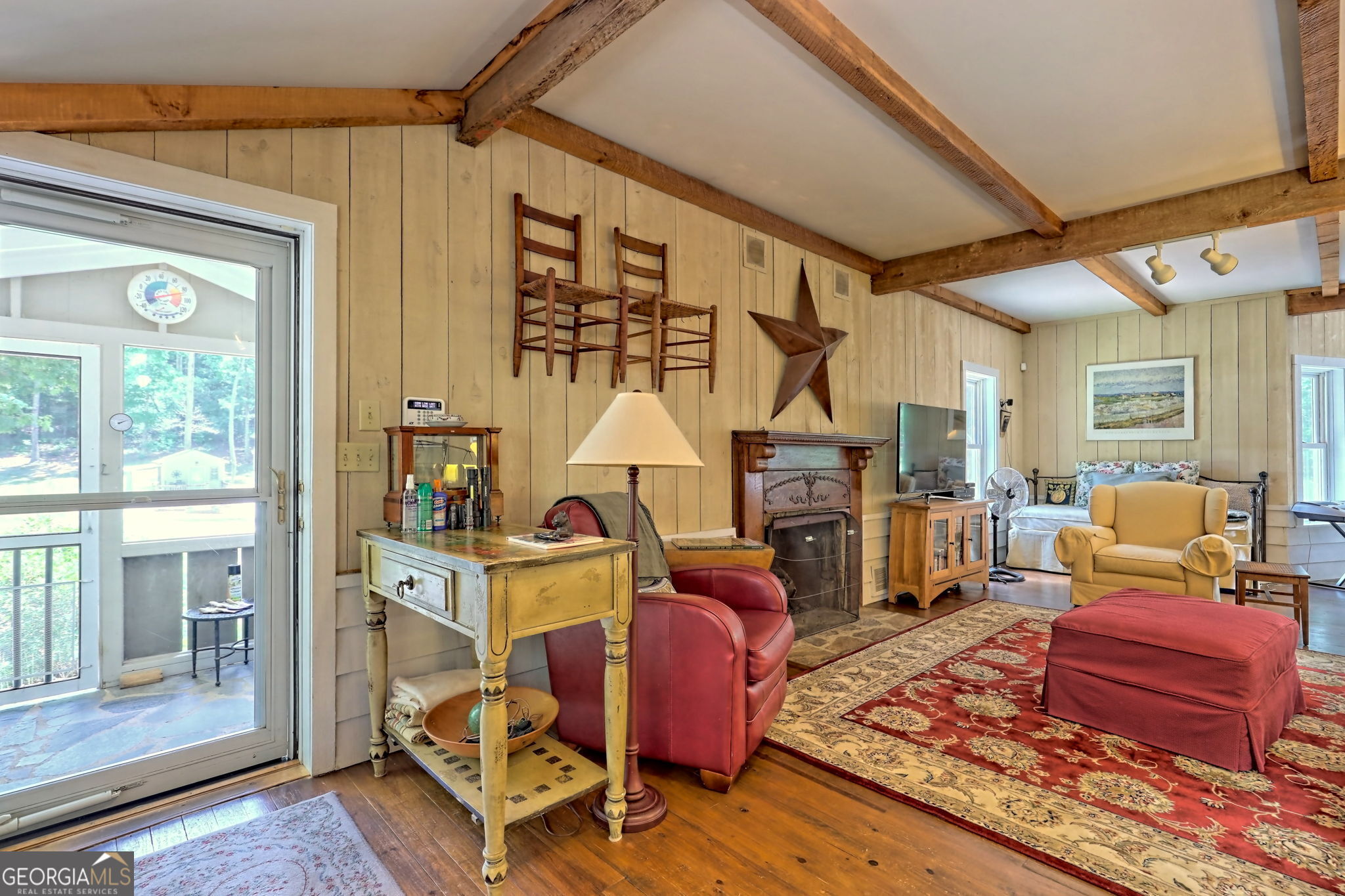 208 Colony Road Dillard, GA 30537 - Photo 31 of 80 a living room with furniture a rug and a window
