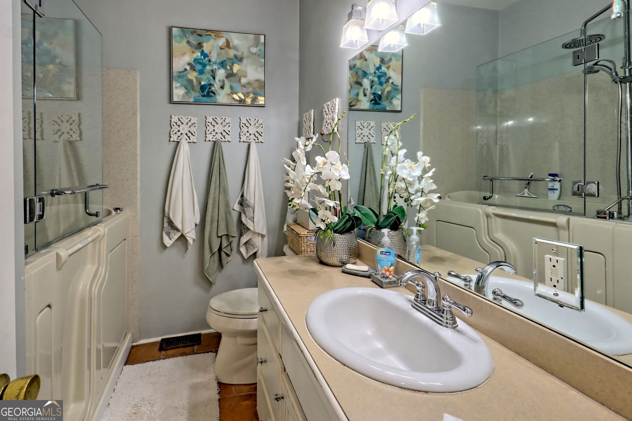 208 Colony Road Dillard, GA 30537 - Photo 35 of 80 a bathroom with a sink a toilet and shower