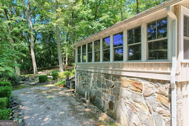 a backyard of a house with lots of green space