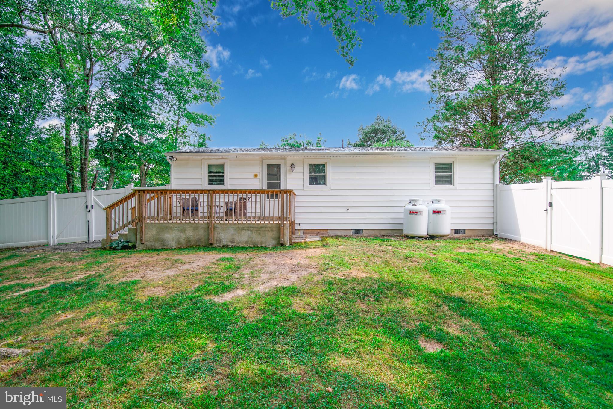 245 Newtown Road Solomons, MD 20688 - Photo 23 of 26 a view of a house with backyard and garden