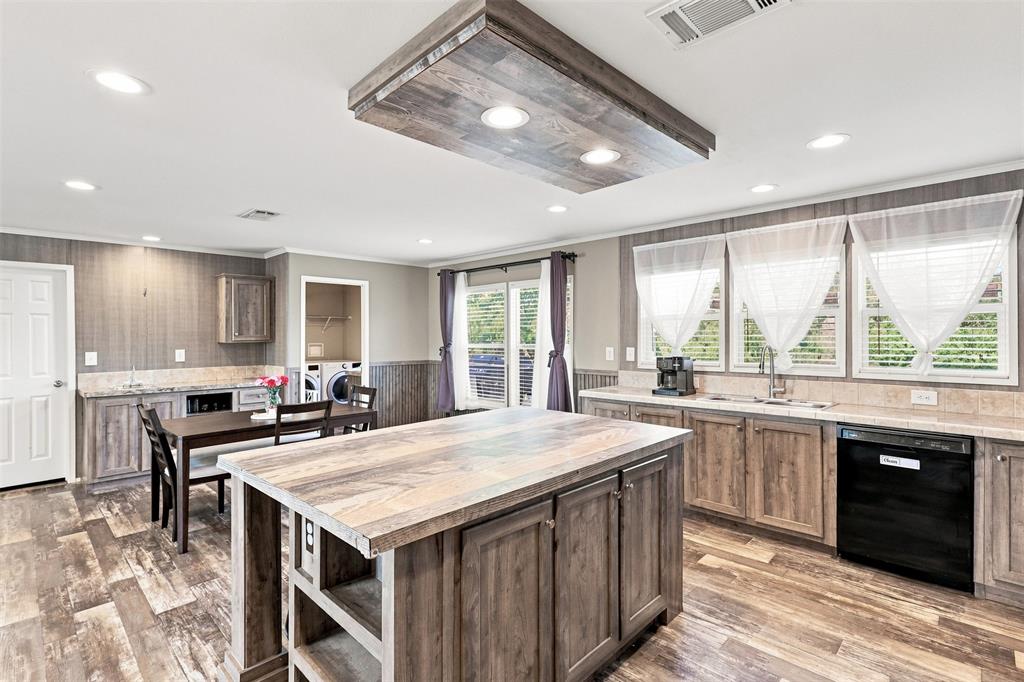 5519 Upper Denton Road Weatherford, TX 76085 - Photo 8 of 38 Spacious kitchen featuring a large island, wood-finish flooring, recessed lighting, and ample cabinetry