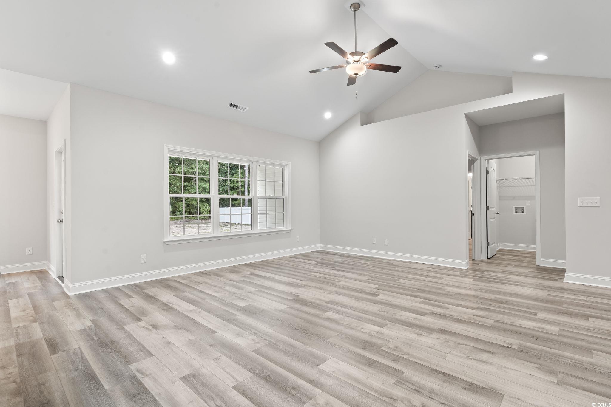 5987 Flossie Road Conway, SC 29527 - Photo 13 of 38 Unfurnished living room with light wood-type floor