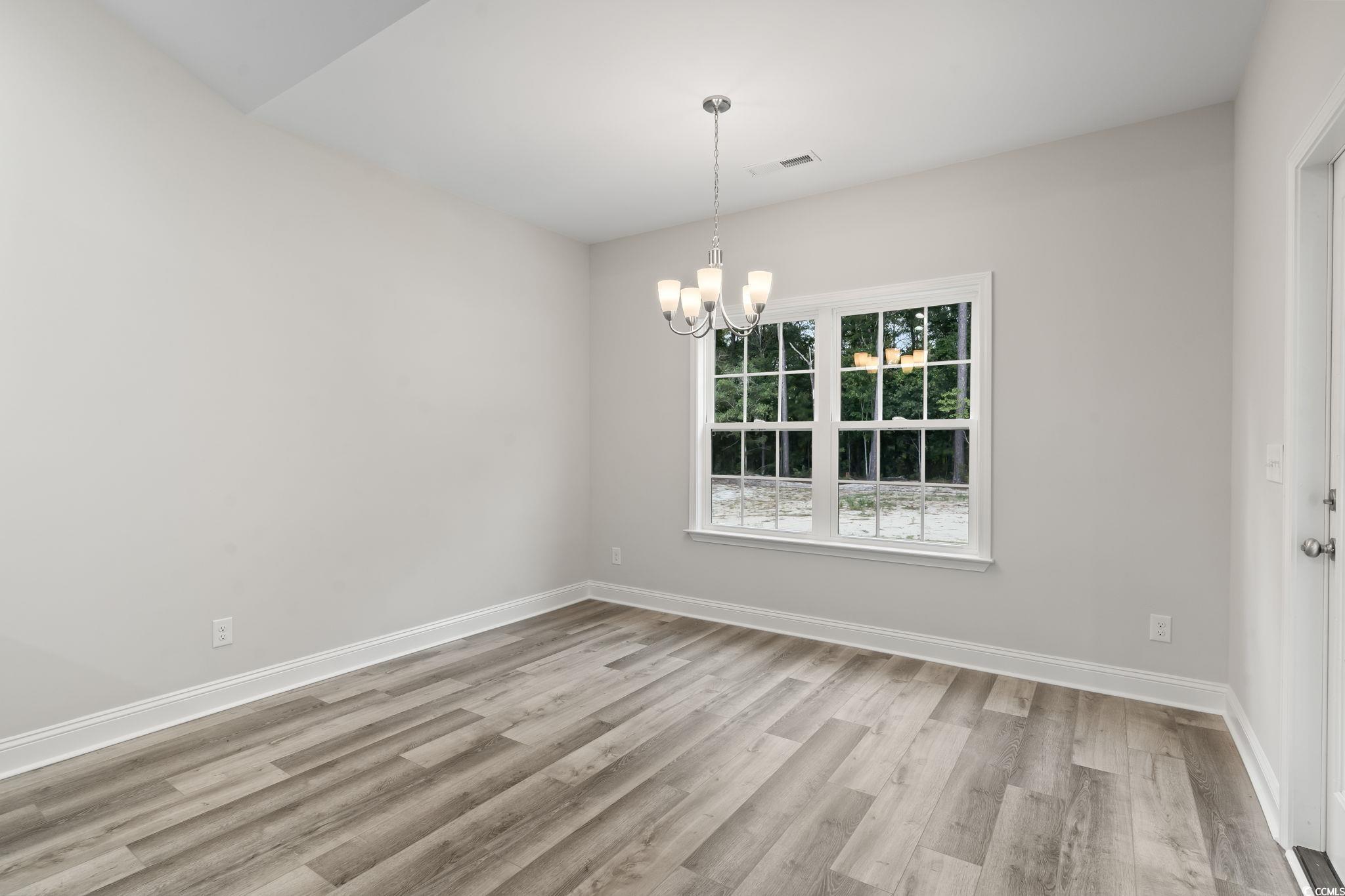 5987 Flossie Road Conway, SC 29527 - Photo 20 of 38 Interior space featuring a notable chandelier and