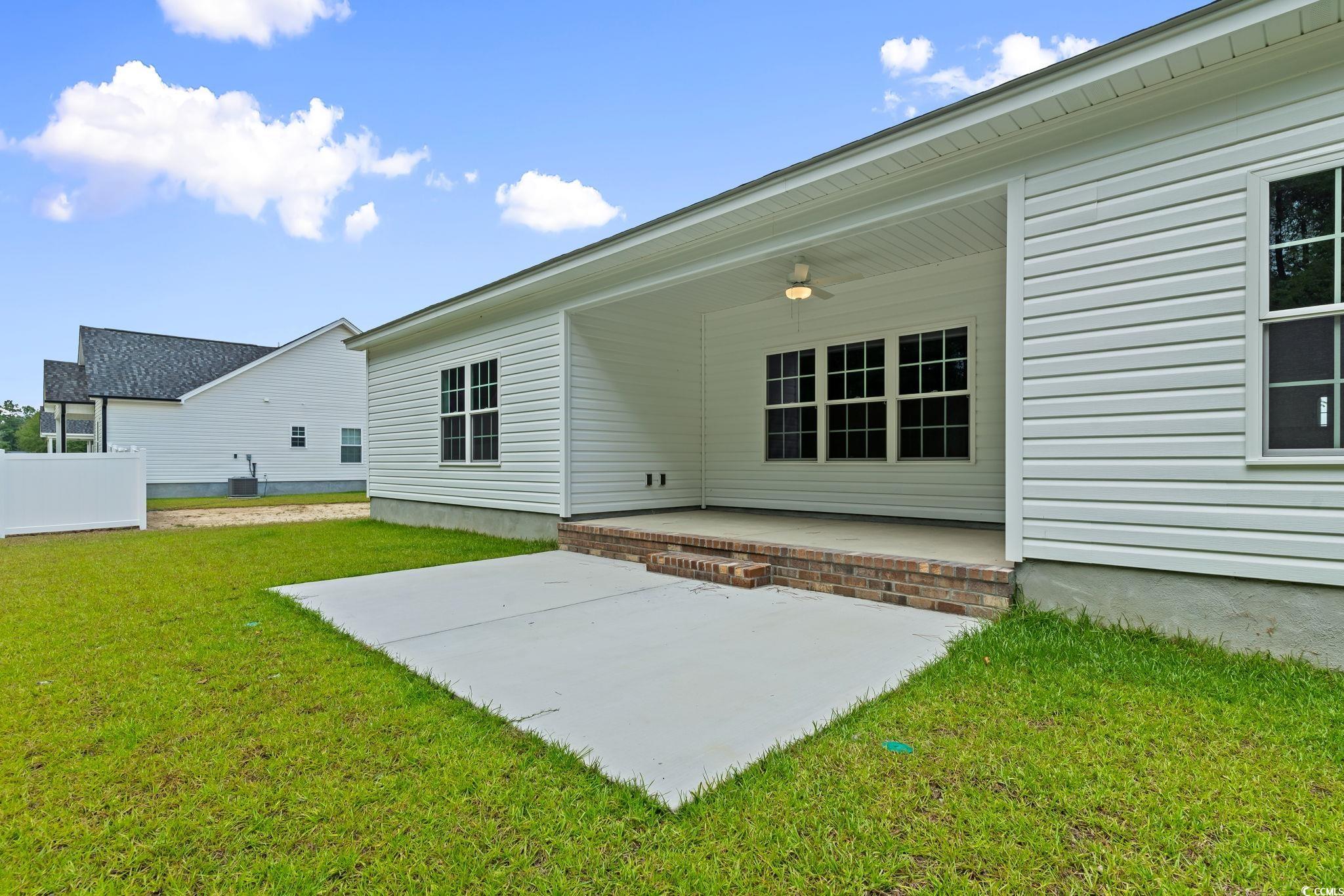5987 Flossie Road Conway, SC 29527 - Photo 22 of 38 Rear view of property featuring a patio area and a