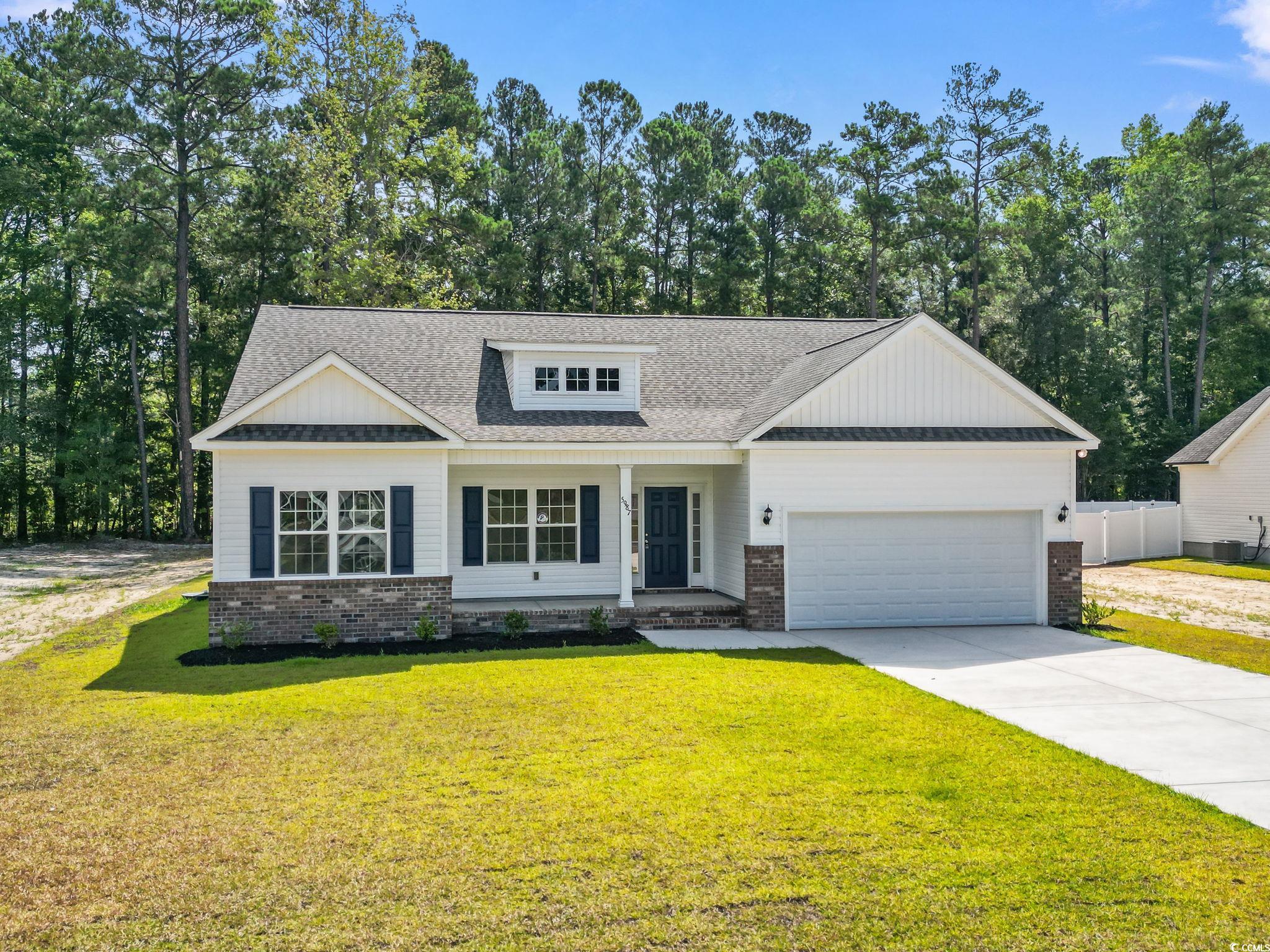 5987 Flossie Road Conway, SC 29527 - Photo 35 of 38 Bathroom featuring plenty of natural light, tub /