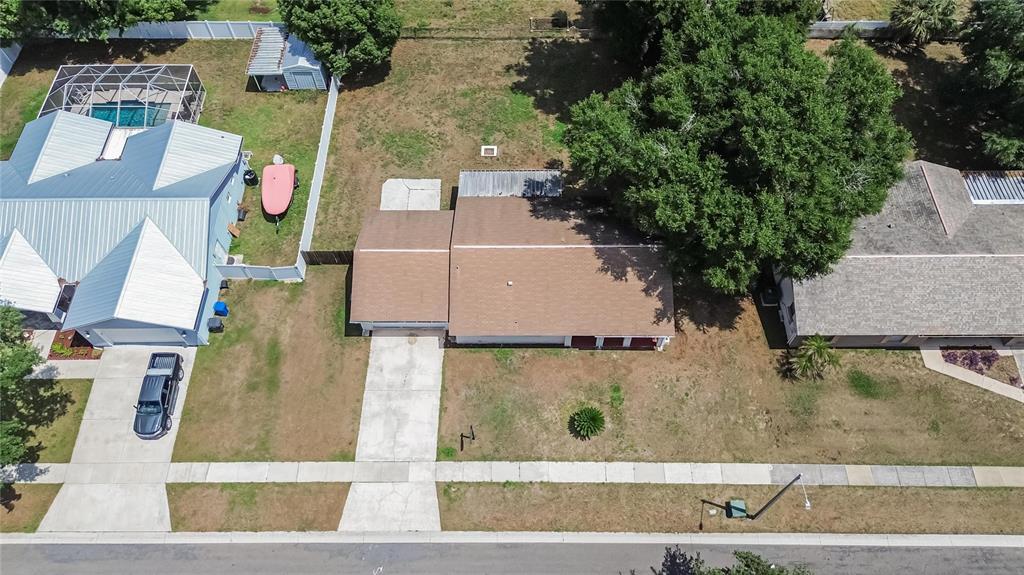 2340 Merrily Circle South Seffner, FL 33584 - Photo 5 of 52 an aerial view of residential houses with outdoor space