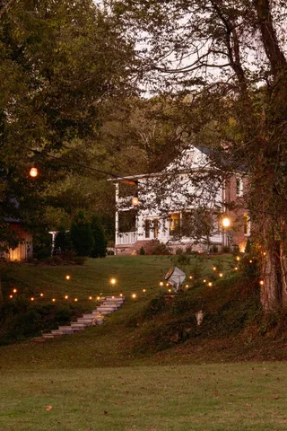 a room with furniture and a chandelier