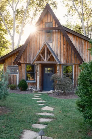 a view of a chairs and table in the patio