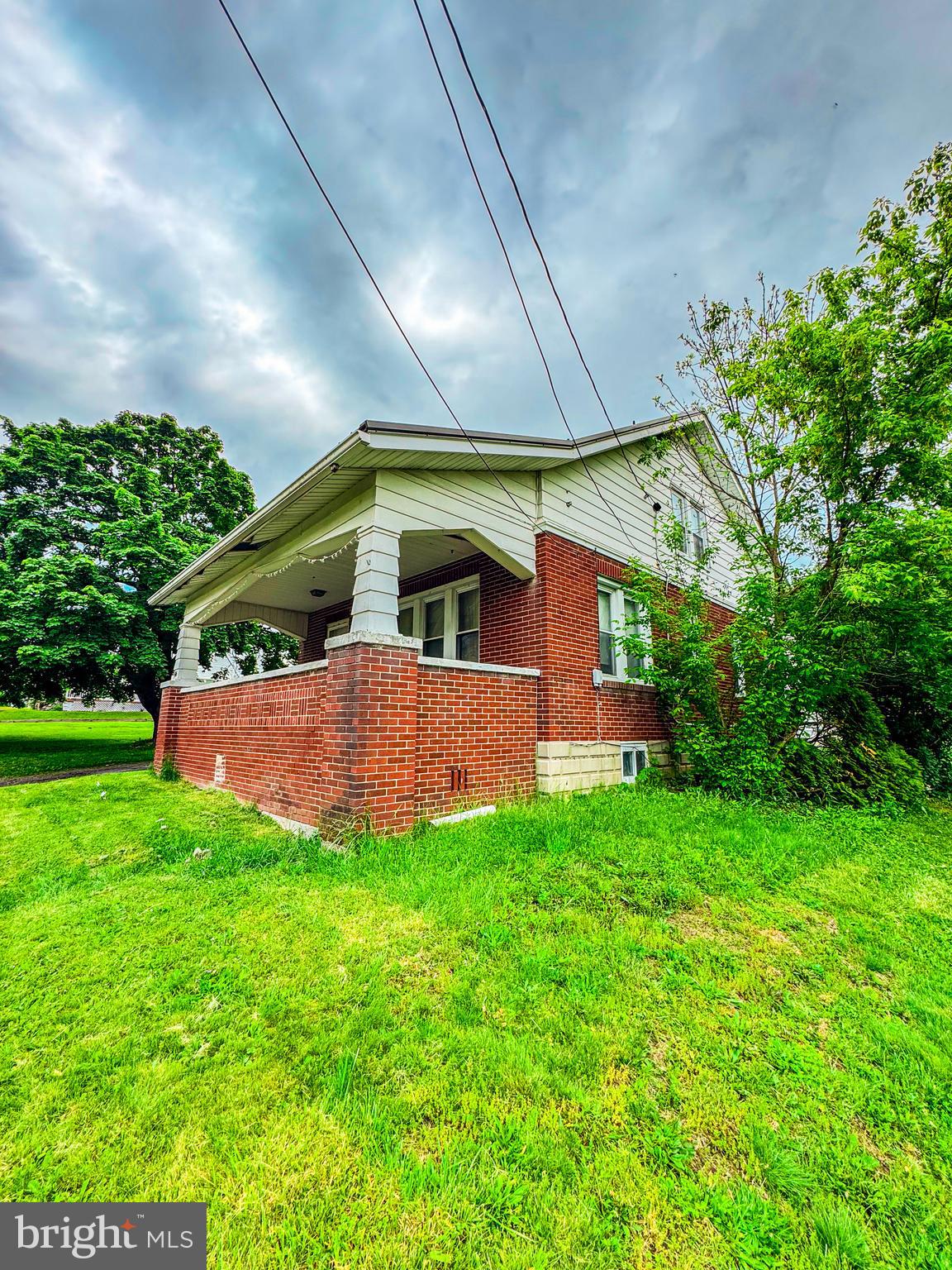 416 Dry Valley Road Burnham, PA 17009 - Photo 22 of 23 a view of an house with backyard and porch
