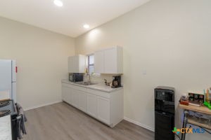 102 Lariat Circle Copperas Cove, TX 76522 - Photo 11 of 14 a room with a sink and a stove top oven