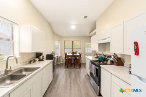 102 Lariat Circle Copperas Cove, TX 76522 - Photo 3 of 14 a kitchen with sink stove and cabinets