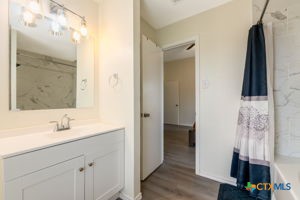 102 Lariat Circle Copperas Cove, TX 76522 - Photo 5 of 14 a bathroom with a sink and a mirror