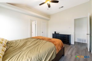 102 Lariat Circle Copperas Cove, TX 76522 - Photo 10 of 14 a spacious bedroom with a bed and a fireplace