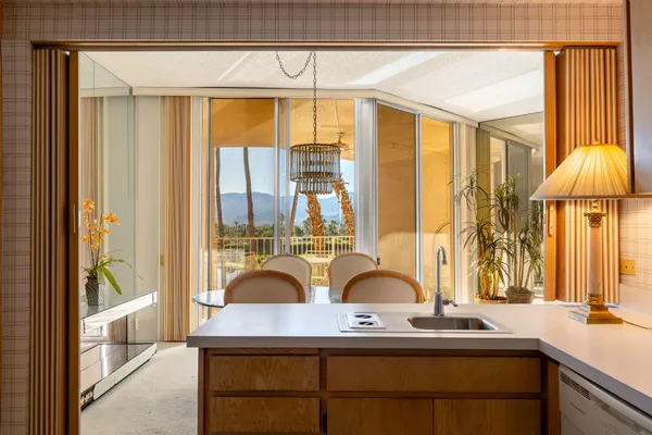 a kitchen with a sink and a window
