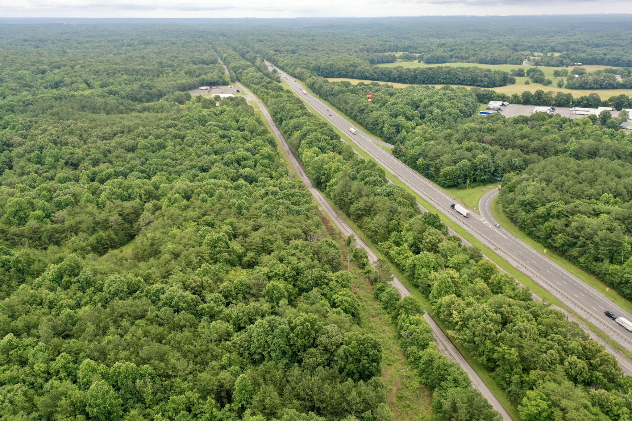 0 Drag Strip Road Fairview, TN 37062 - Photo 8 of 17 an aerial view of residential houses with outdoor space and trees
