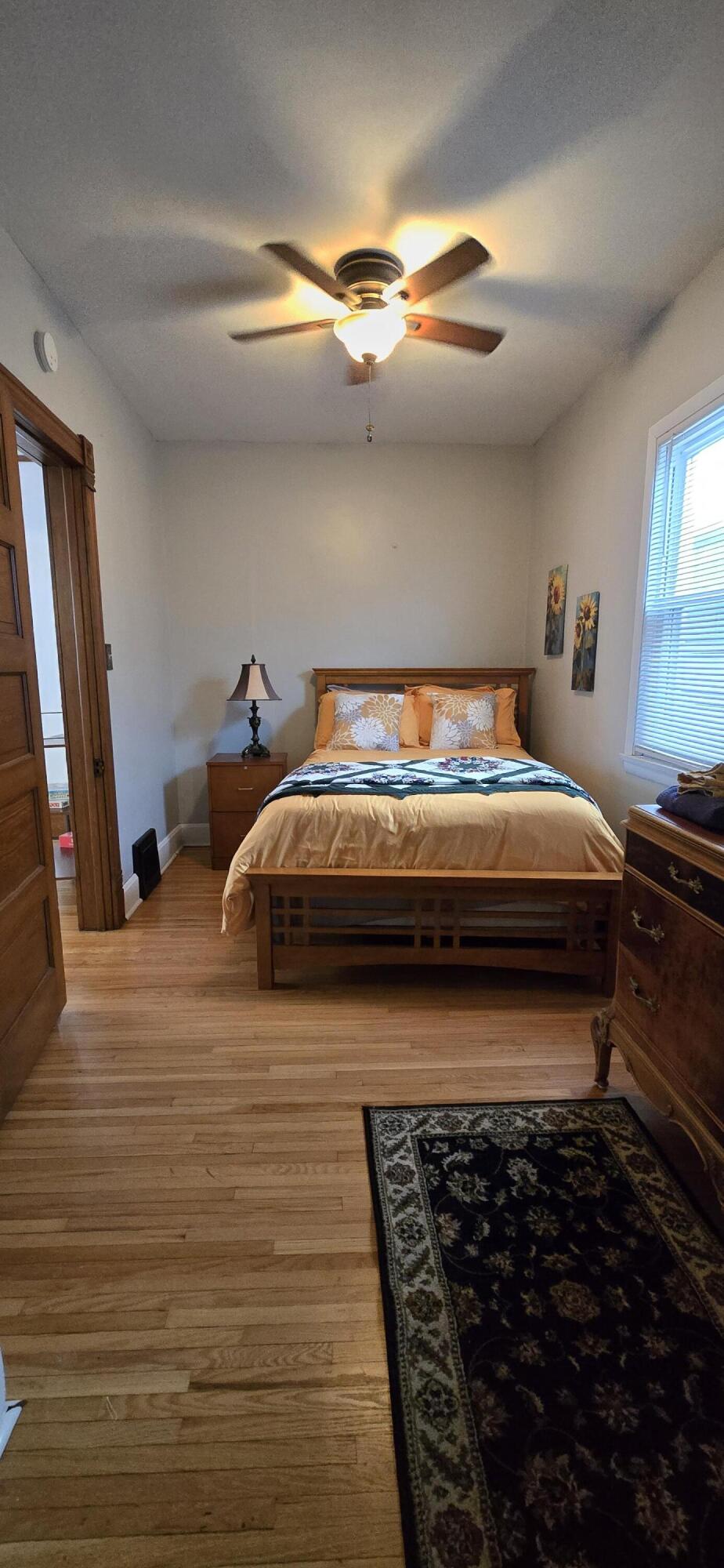 1647 Myrtle Avenue, Unit 1 Whiting, IN 46394 - Photo 12 of 20 a bedroom with bed and window