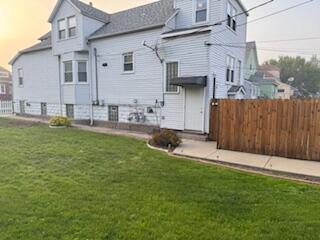 1647 Myrtle Avenue, Unit 1 Whiting, IN 46394 - Photo 2 of 20 a view of a house with a yard and sitting area