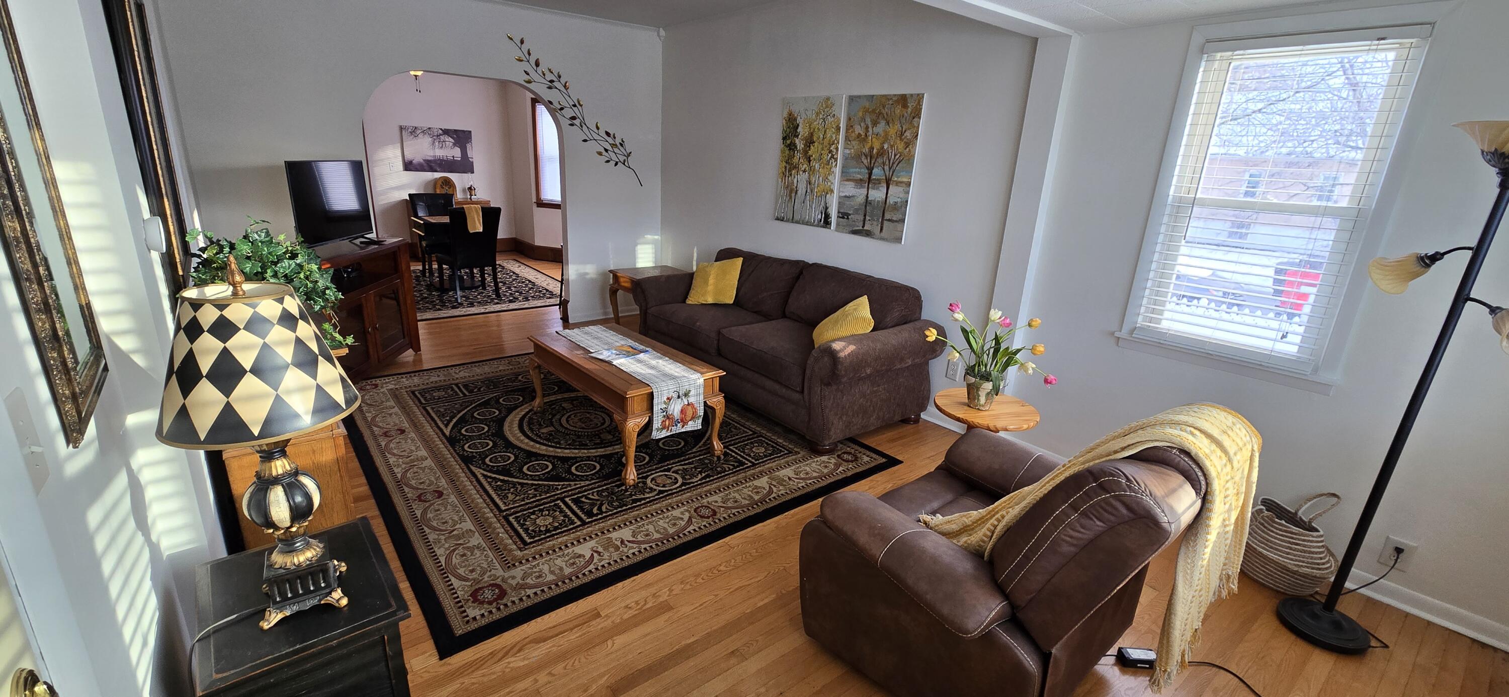 1647 Myrtle Avenue, Unit 1 Whiting, IN 46394 - Photo 9 of 20 a living room with furniture and a window