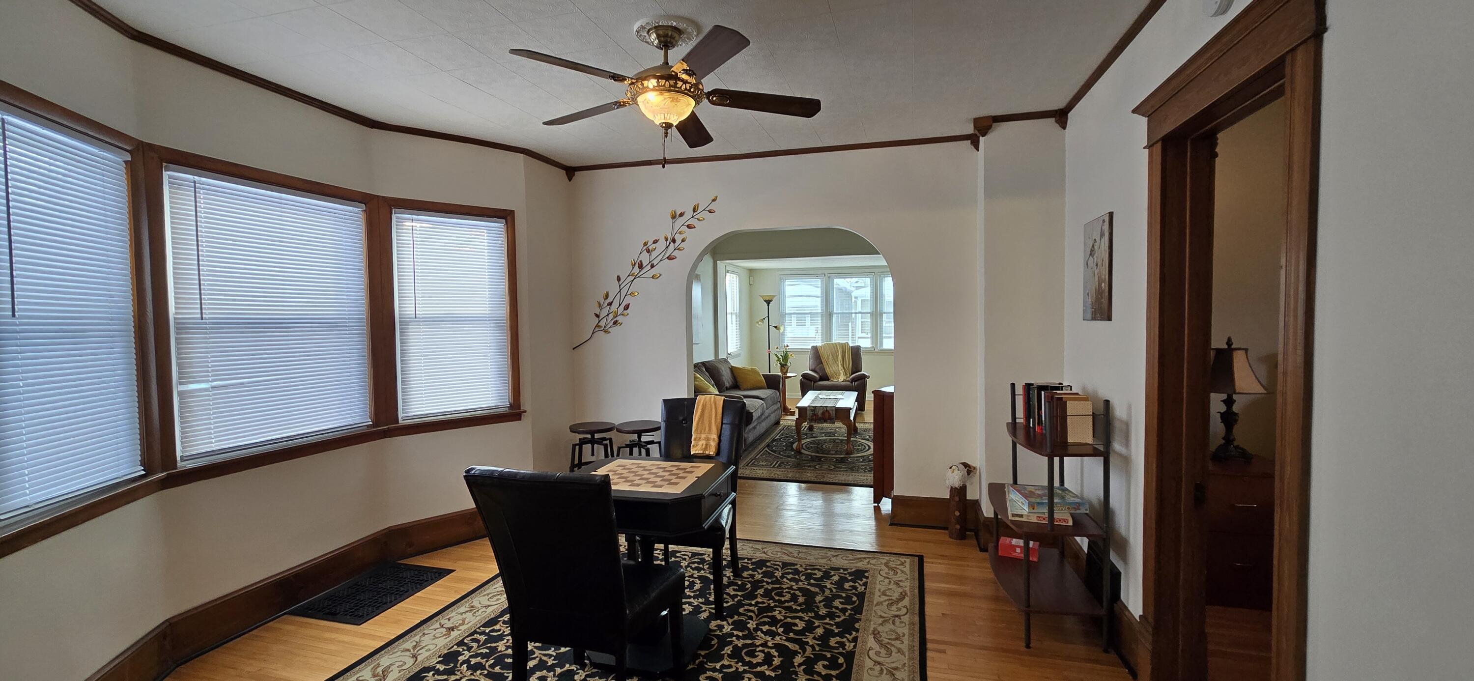 1647 Myrtle Avenue, Unit 1 Whiting, IN 46394 - Photo 10 of 20 a view of a dining room with furniture and window