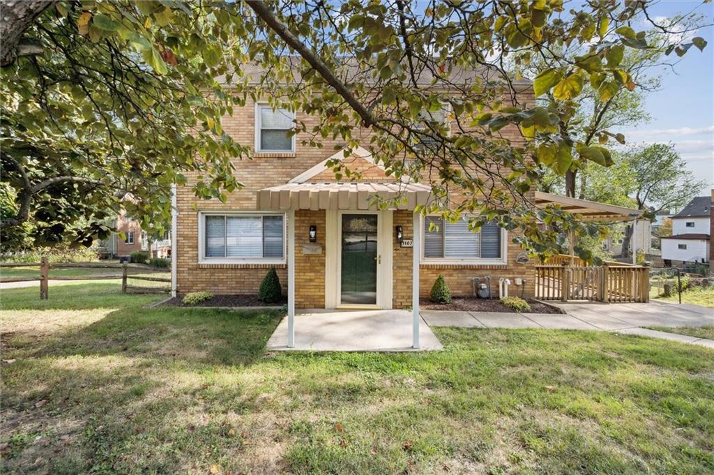1167 Lapish Road Pittsburgh, PA 15212 - Photo 1 of 45 a front view of a house with a yard