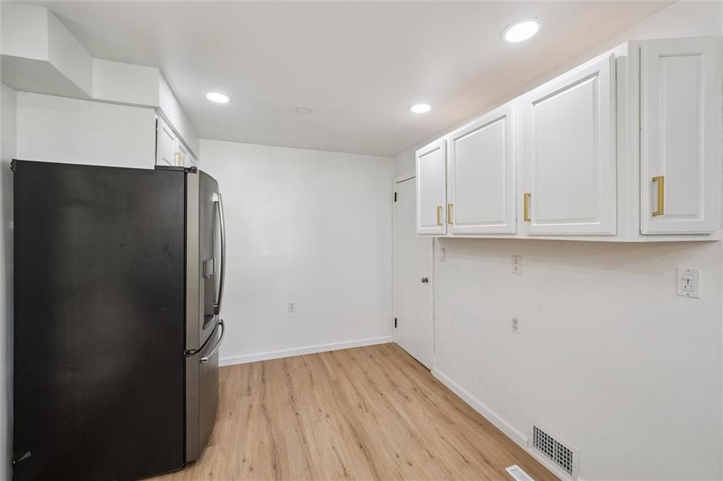 1167 Lapish Road Pittsburgh, PA 15212 - Photo 14 of 45 a view of cabinets and wooden floor