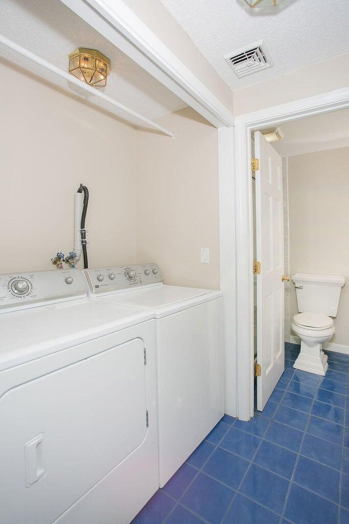 174 Lowell Road, Unit E59 Mashpee, MA 02649 - Photo 9 of 19 laundry