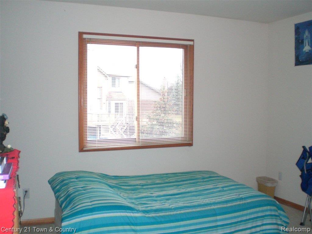 979 River Mist Drive Rochester, MI 48307 - Photo 16 of 24 Bedroom 4.jpg