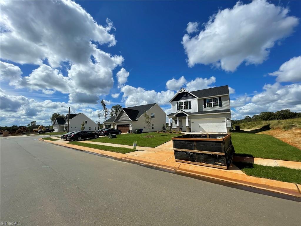 1823 Parham Drive Graham, NC 27253 - Photo 4 of 32 This lot has a Duke Energy Easement on the side that is shared with the other lot. The lot has a front width of 100 ft which allows a lot of distance to the neighboring house.
