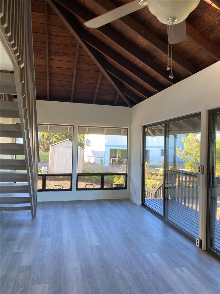 180 Ainakula Road Kula, HI 96790 - Photo 11 of 30 a view of a room with wooden floor