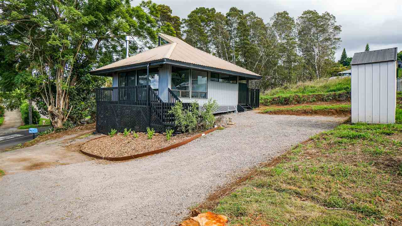 180 Ainakula Road Kula, HI 96790 - Photo 25 of 30 a view of a small house with yard