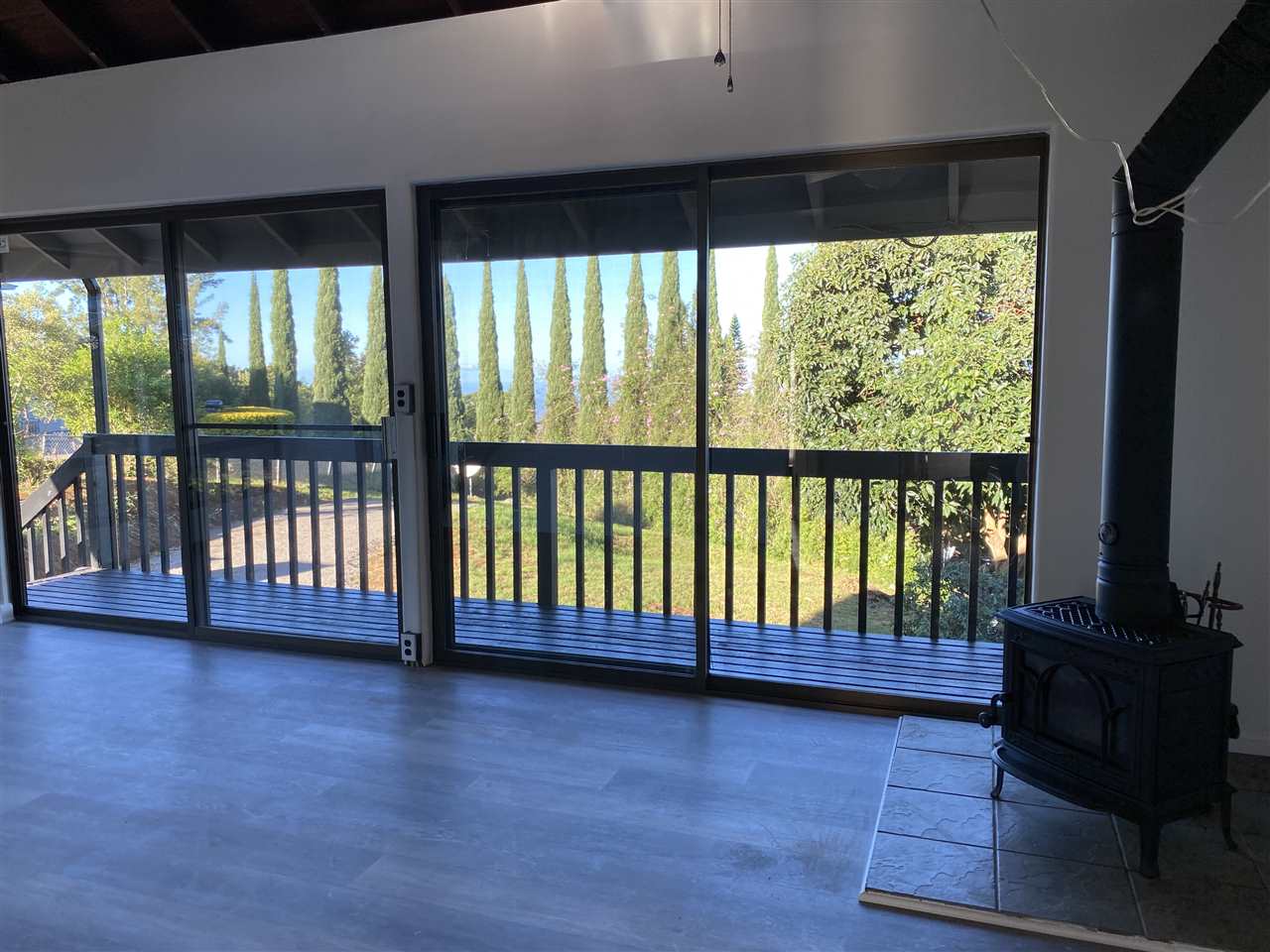 180 Ainakula Road Kula, HI 96790 - Photo 10 of 30 a view of a large window with wooden floor