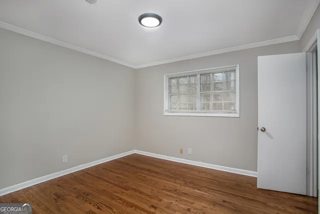 a bathroom with a granite countertop toilet a sink and a bathtub