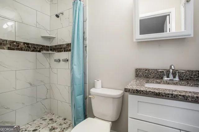 a view of room with furniture