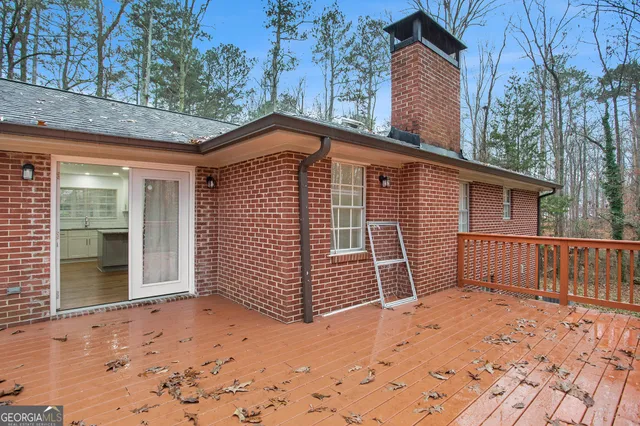 a view of a backyard with trees