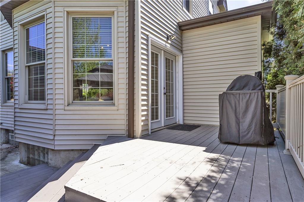 1226 Mayview Road Pittsburgh, PA 15241 - Photo 41 of 42 The spacious back deck invites you to host summer dinners, morning coffee, or evening relaxation with views of your private yard.