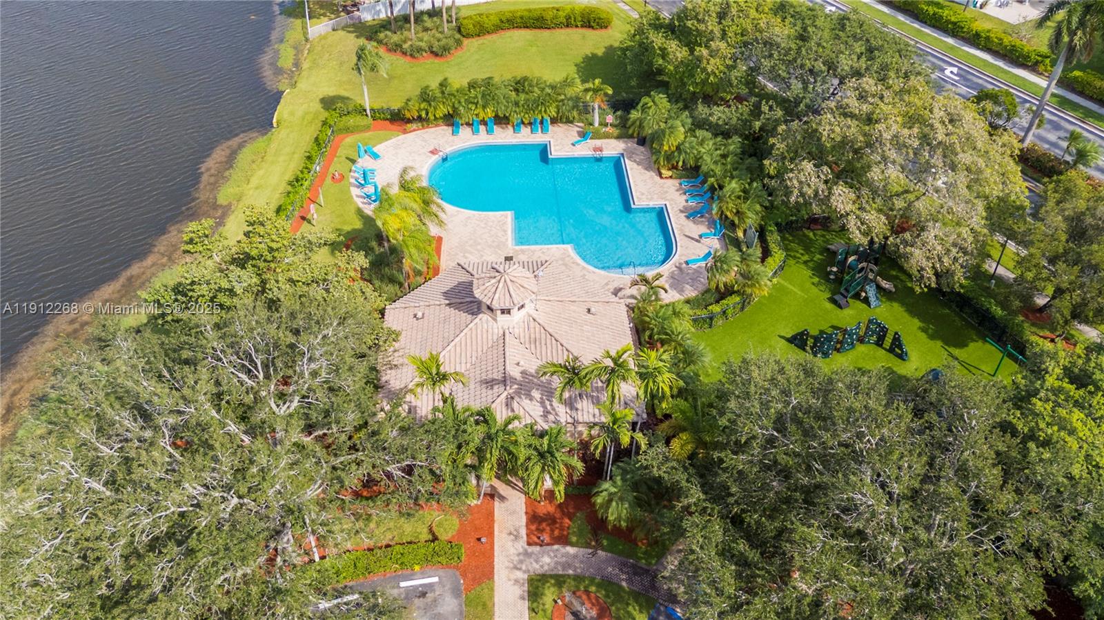 16285 Southwest 19th Street Miramar, FL 33027 - Photo 24 of 36 an aerial view of a house with a yard and swimming pool