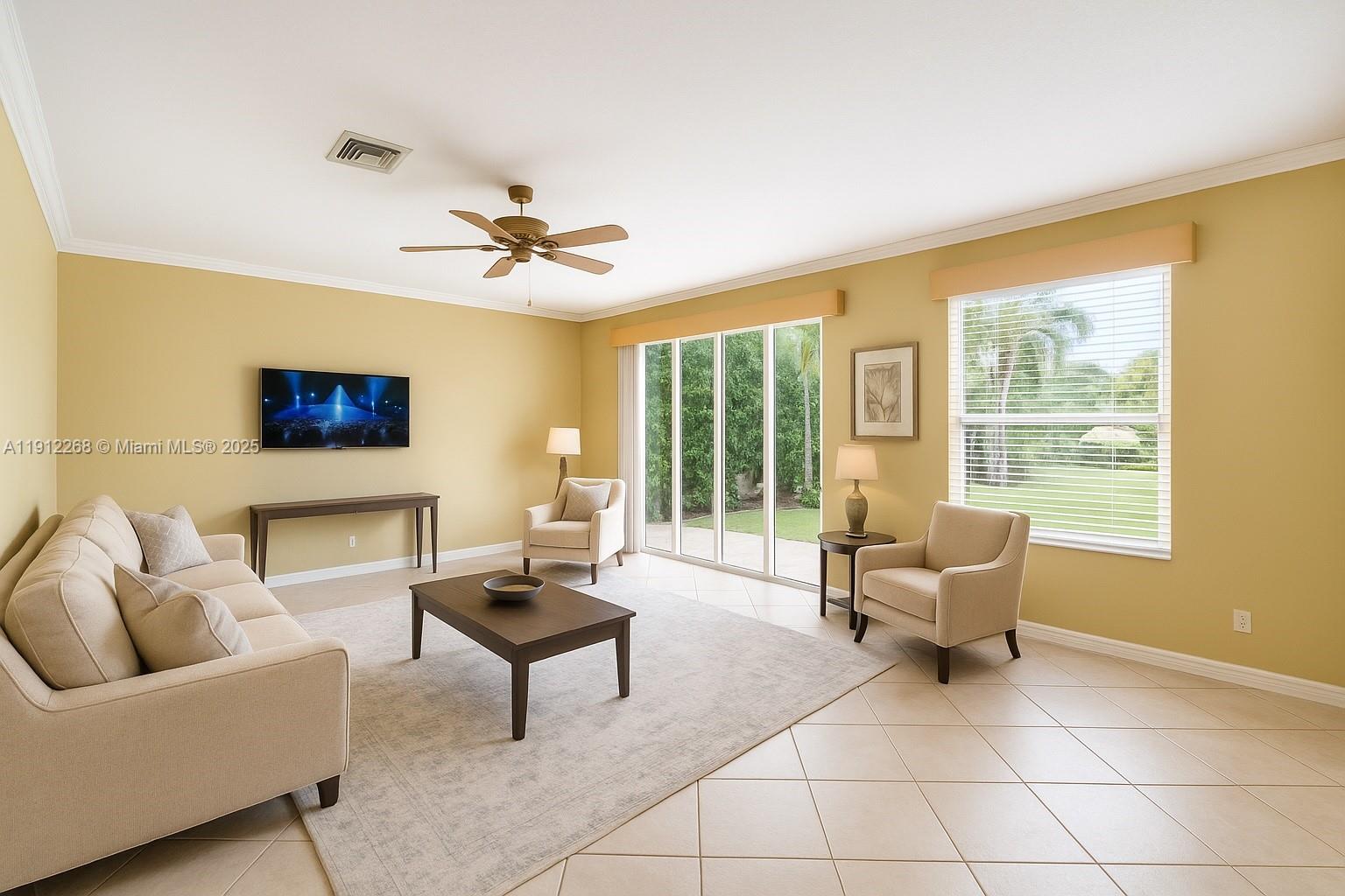 16285 Southwest 19th Street Miramar, FL 33027 - Photo 7 of 36 a living room with furniture and a window