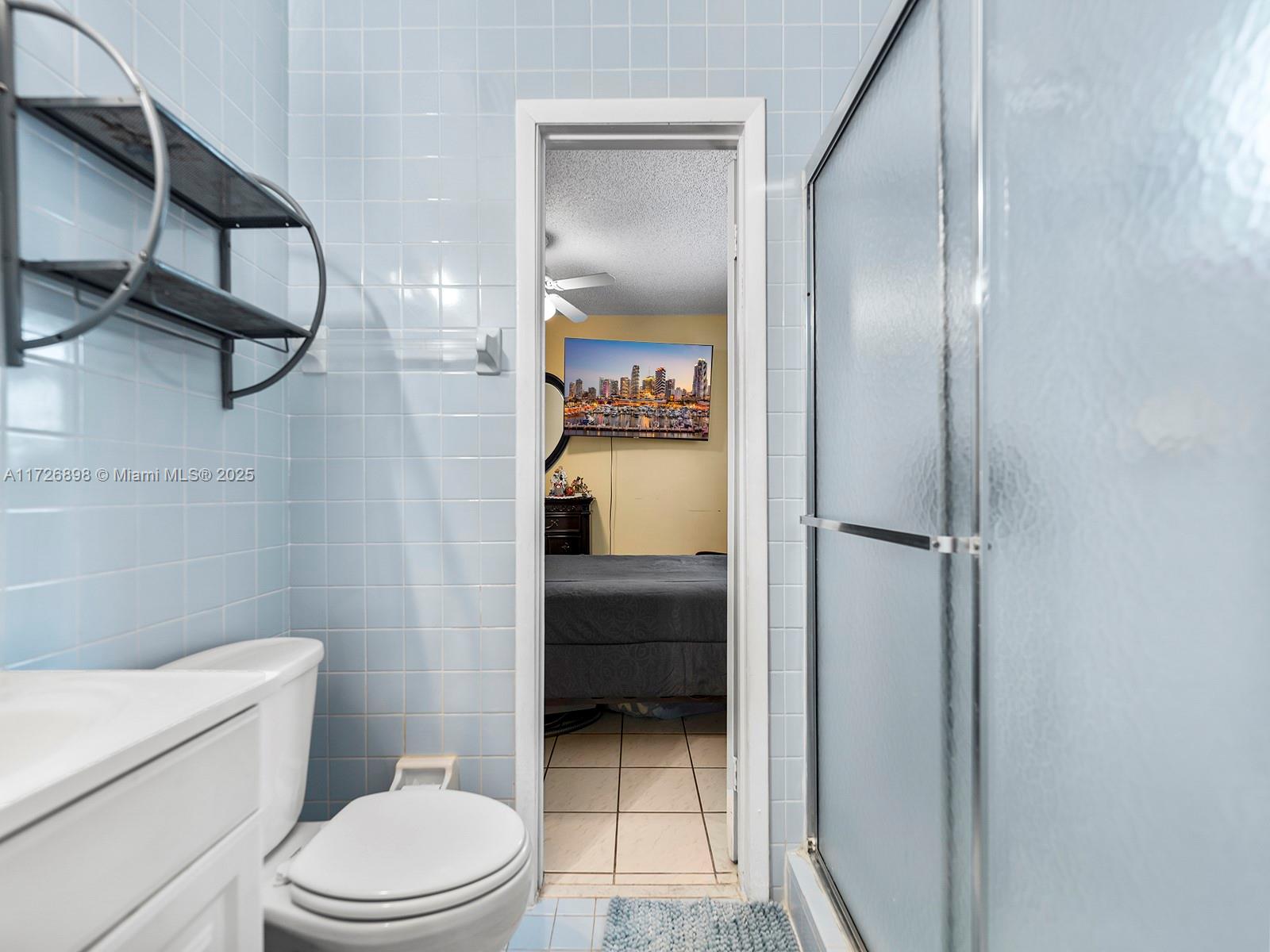 15915 Southwest 103rd Place Miami, FL 33157 - Photo 22 of 34 Jack and Jill Bathroom
