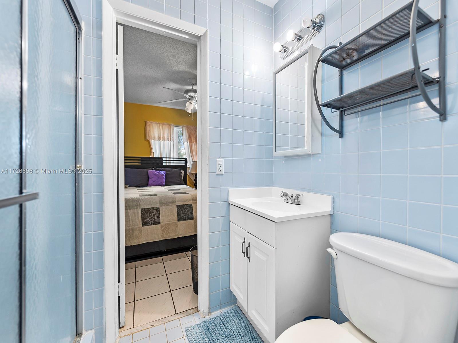 15915 Southwest 103rd Place Miami, FL 33157 - Photo 23 of 34 Jack and Jill Bathroom
