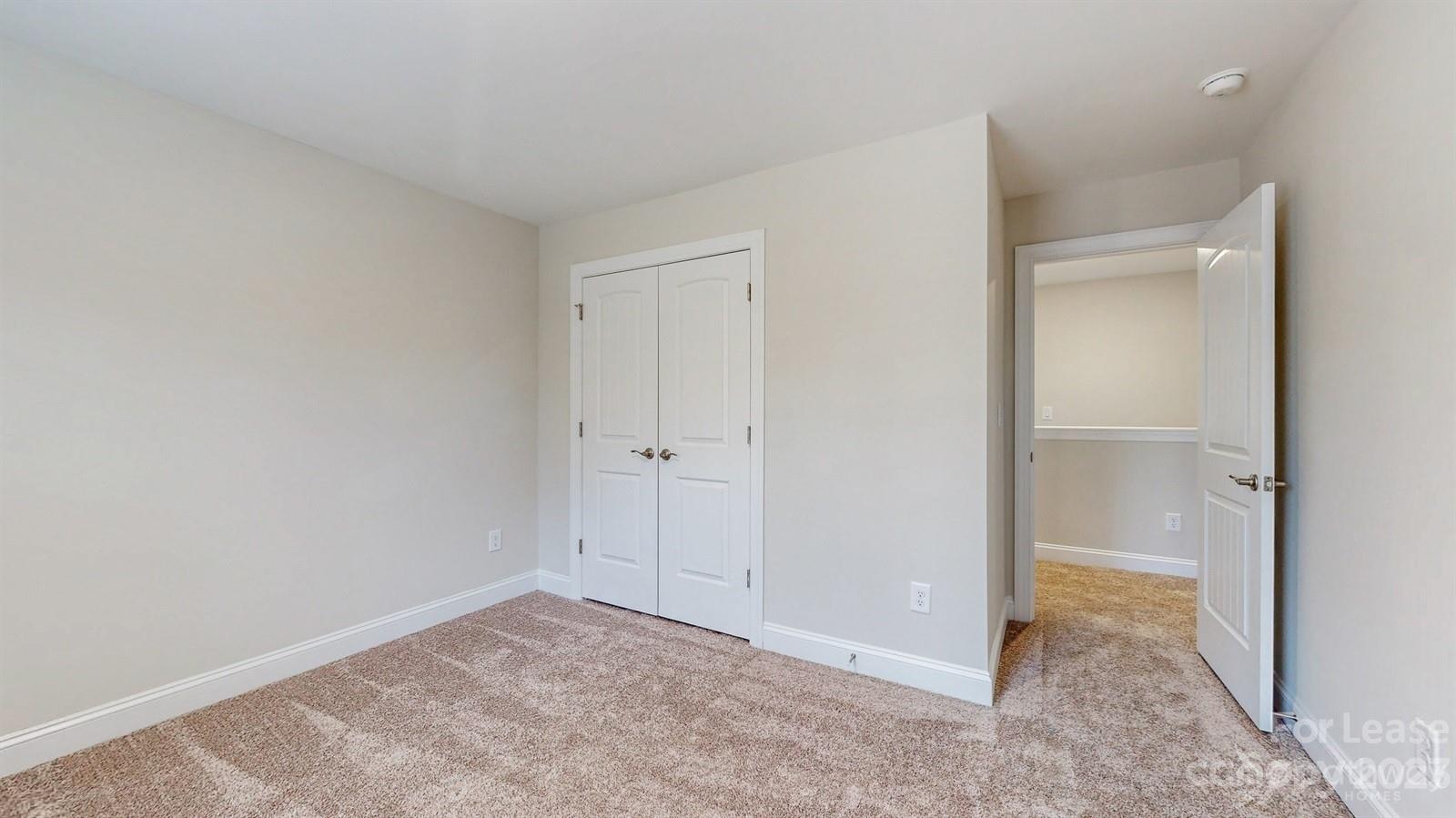 163 Brixham Loop Troutman, NC 28166 - Photo 20 of 34 a view of an empty room and closet