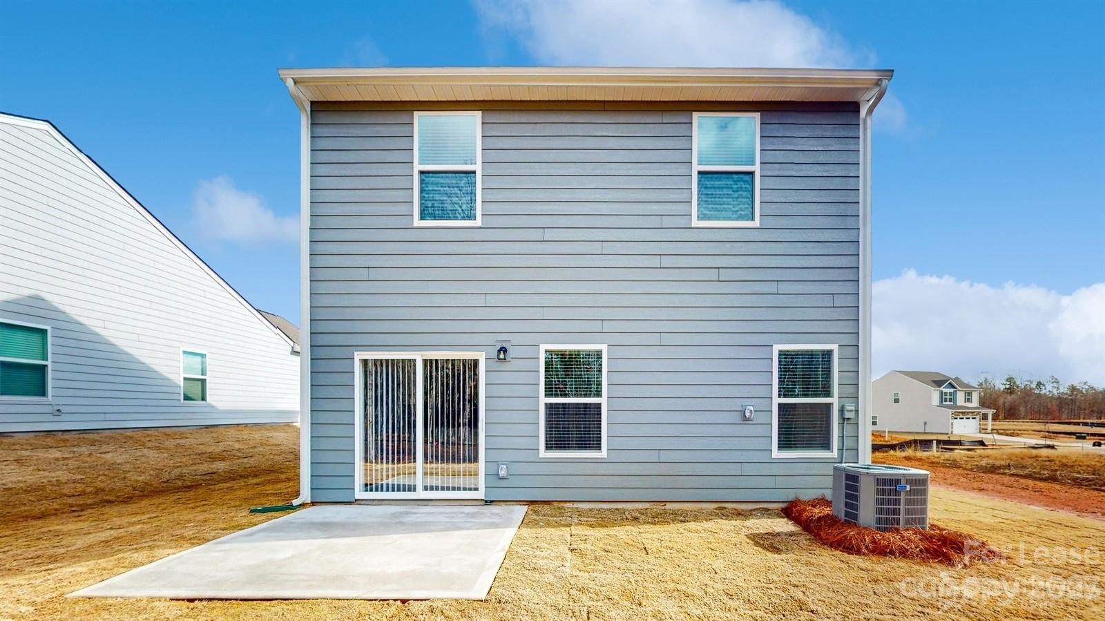 163 Brixham Loop Troutman, NC 28166 - Photo 25 of 34 a view of a house with outdoor space