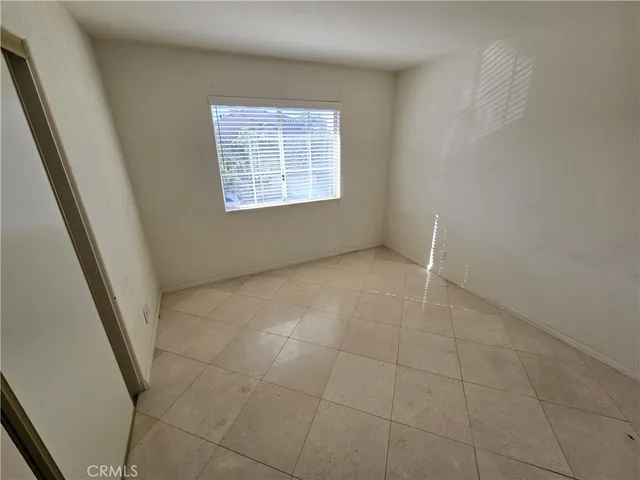 a bathroom with a toilet a sink and a mirror