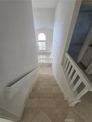 a view of entryway and hall with a window