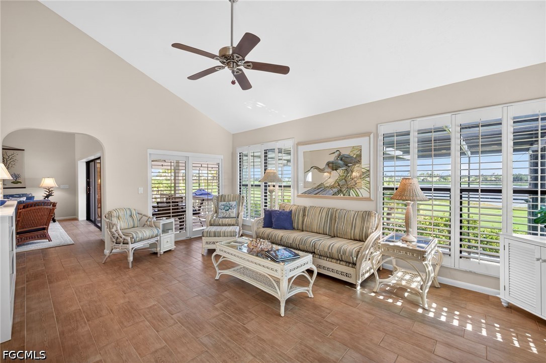 1057 Sand Castle Road Sanibel, FL 33957 - Photo 13 of 50 a living room with furniture and a large window